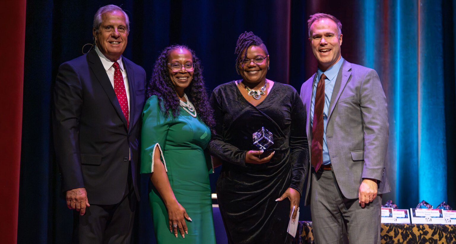 George Wilkinson accepts the C.S. Mott Award at the Art of Achievement Awards